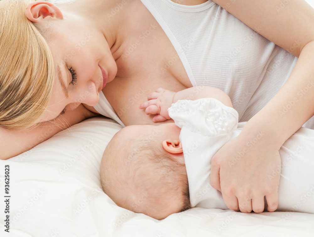 Wunschmotiv: Young mother breastfeeds her baby. Breast-feeding. #93625023