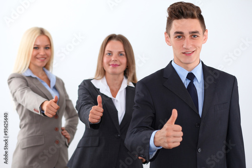 Group of business people, thumbs up