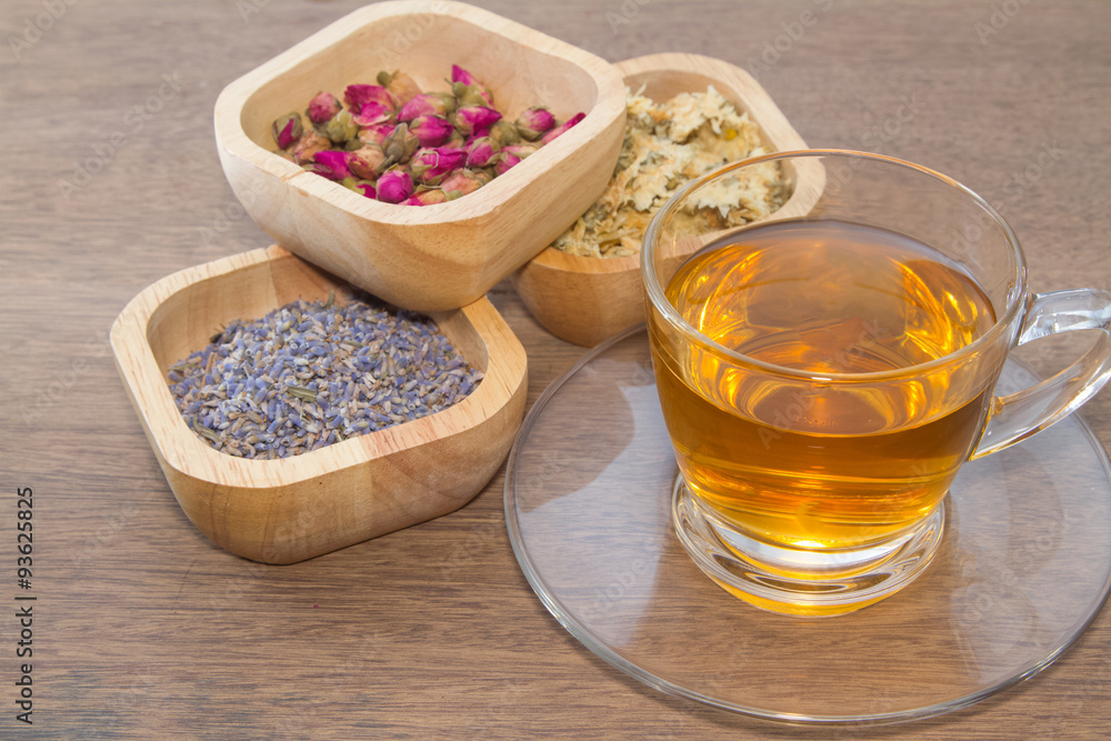 varieties of flower tea on wooden bowl varieties of flower tea on wooden bowl