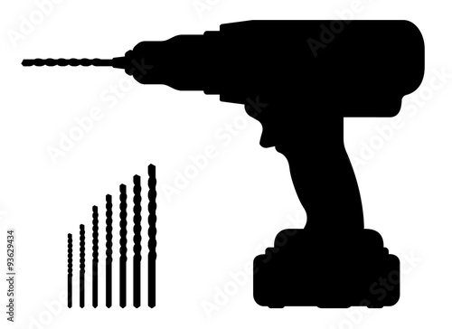 Electric cordless hand drill silhouette with bits photo