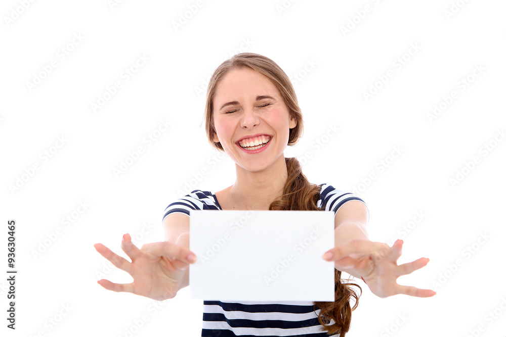 Student girl showing white blank sheet - copy space, isolated over background Student girl showing white blank sheet - copy space, isolated over background