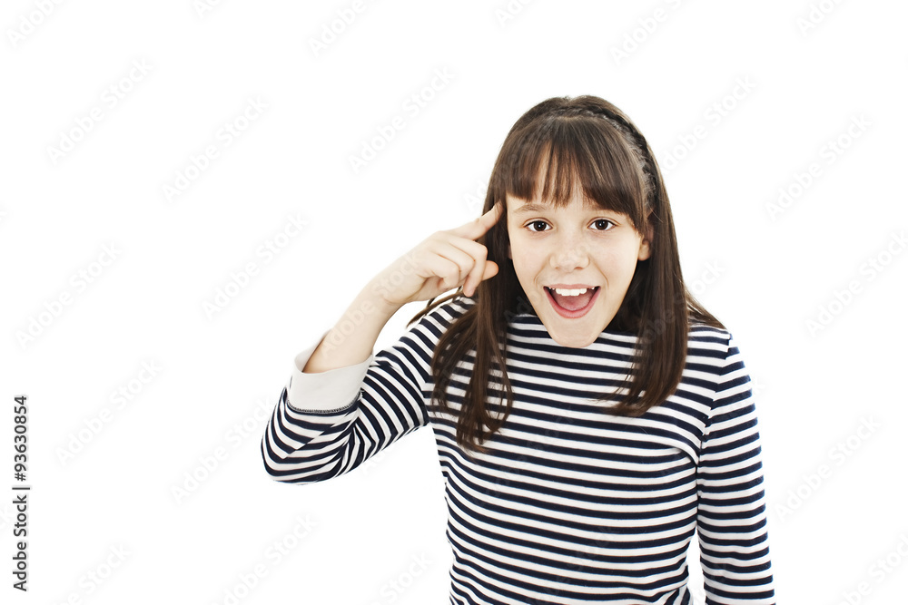Closeup portrait angry mad teenager girl gesturing with her finger against temple asking are you crazy? Isolated on white background. Closeup portrait angry mad teenager girl gesturing with her finger against temple asking are you crazy? Isolated on white background.