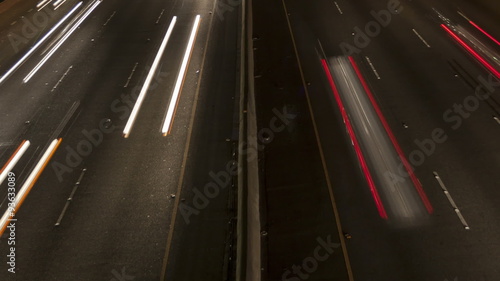 Time lapse close up freeway light trails at night
