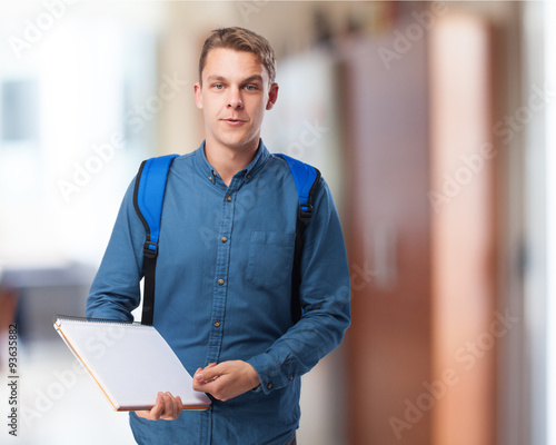 happy student man with a notebook