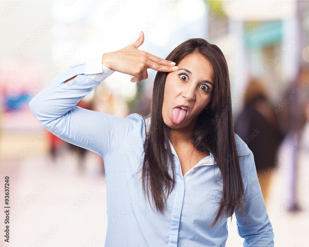 woman doing a suicide gesture