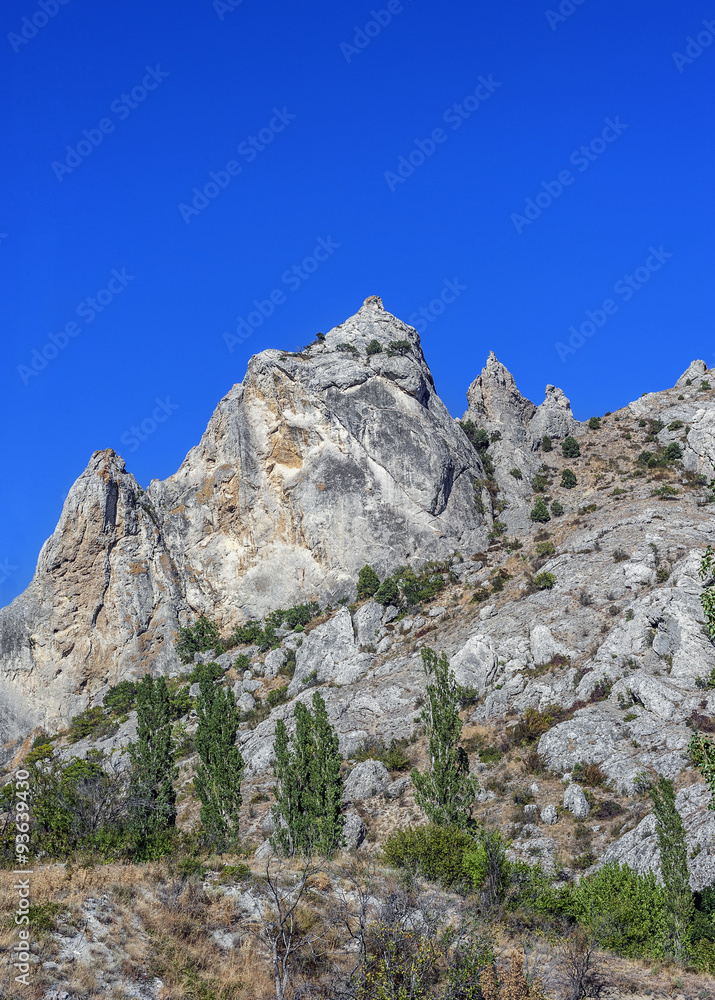 Bizarre fabulous rocks around the village of Sun Valley./ Russia, Crimea, the village of Sun Valley. Bizarre fabulous rocks around the village of Sun Valley./ Russia, Crimea, the village of Sun Valley.