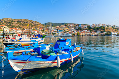Traditional blue and white colour Greek fishing boat in Pythagorion port, Samos island, Greece