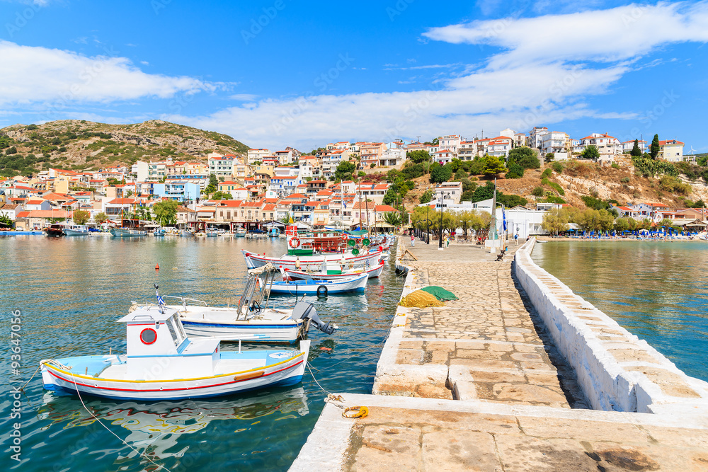 A view of Pythagorion port with traditional colourful Greek fishing boats, Samos island, Greece
