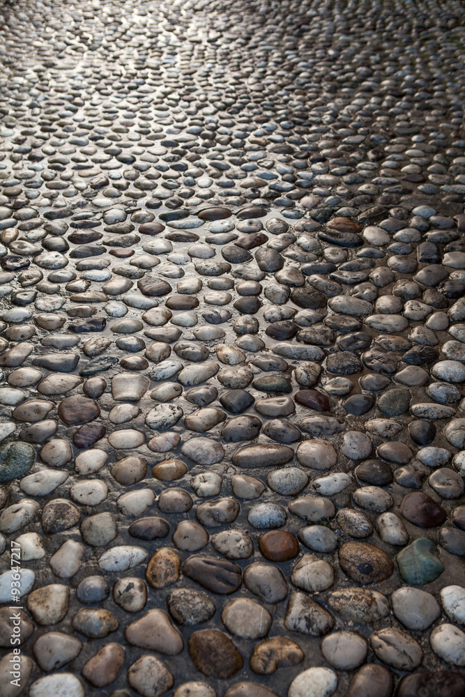 Natural round stone floor texture for background Natural round stone floor texture for background
