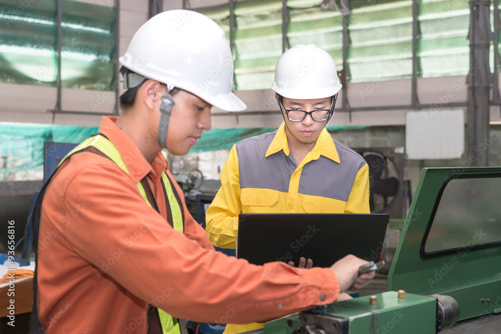 Asian Mechanical Engineer using computer-aided to do planning an Asian Mechanical Engineer using computer-aided to do planning an