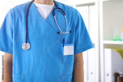 Closeup portrait of a doctor with stethoscope holding folder