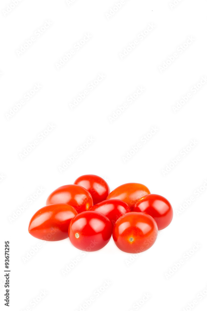 Red cherry tomatoes on white background Red cherry tomatoes on white background