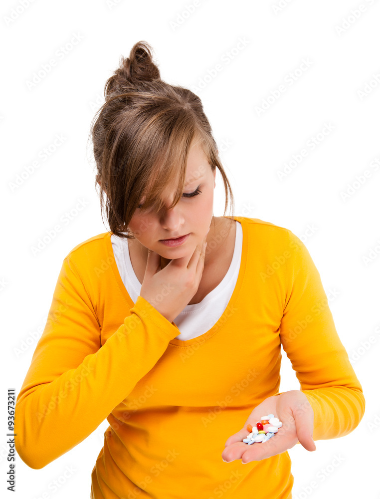Sore throat - woman holding pills isolated on white background Sore throat - woman holding pills isolated on white background