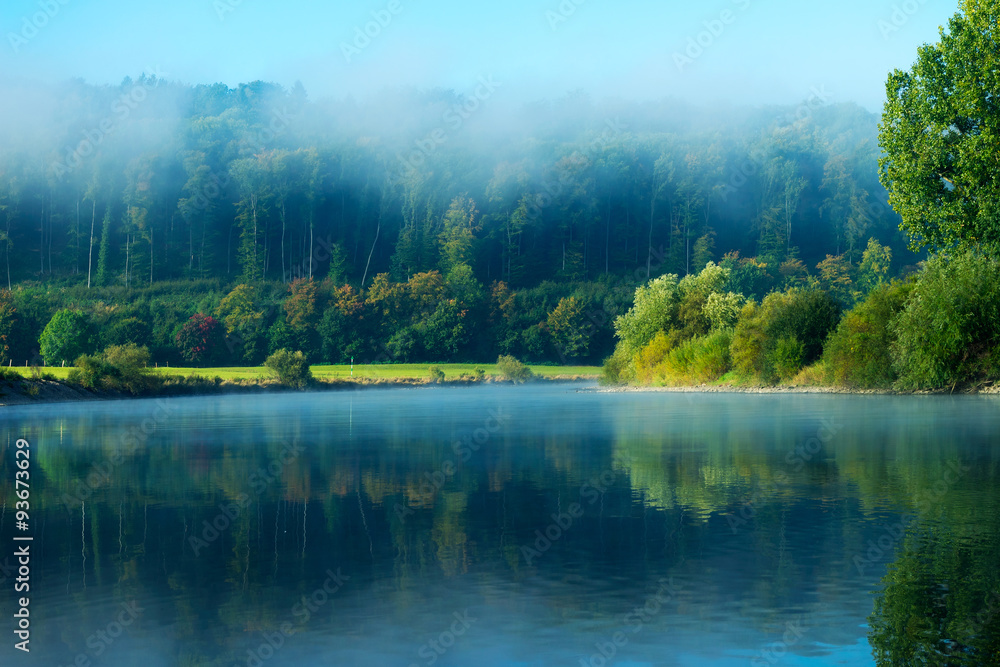 Morning fog over the river in  sunshine