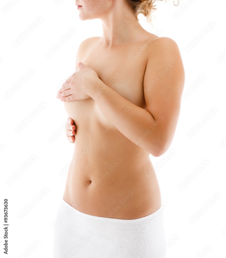 Naklejka premium Woman examining her breast isolated on white background 
