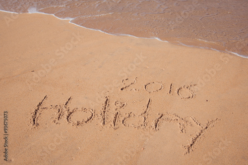 Holiday 2016 handwriting on sand