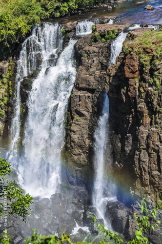 Waterfall with rainbow at Iguazu Falls   Brazil