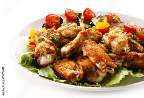 Grilled chicken wings and vegetables