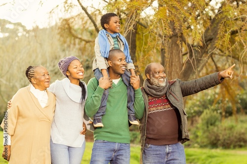 Extended family posing with warm clothes