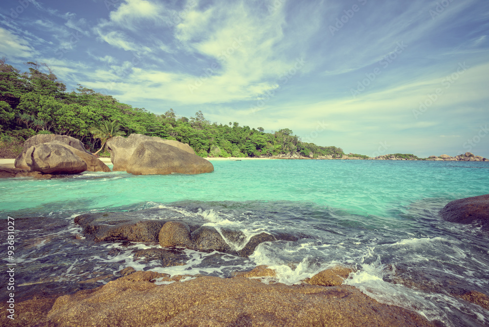 Vintage style beautiful nature of blue sea and white waves near the rocks during summer at Koh Miang island in Mu Ko Similan National Park, Phang Nga province, Thailand