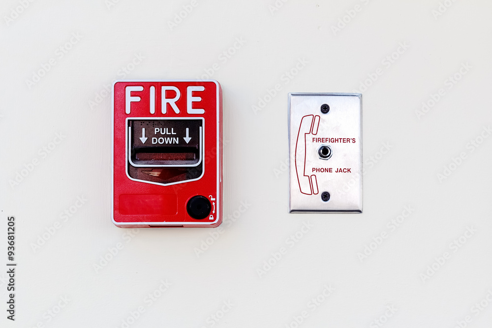 Fire Alarm and Firefighter's Phone Socket on white Concrete Wall Fire Alarm and Firefighter's Phone Socket on white Concrete Wall