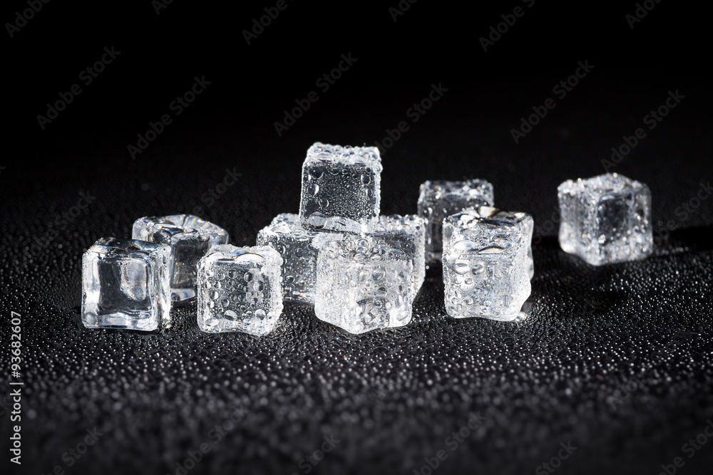 Beautiful ice cube on a black background Beautiful ice cube on a black background
