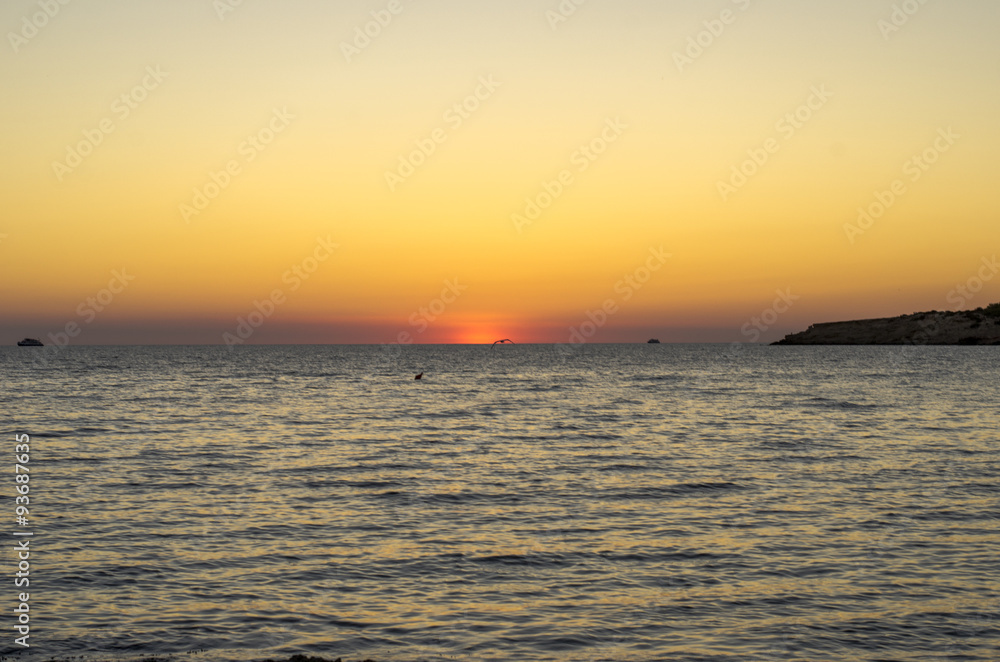 Beautiful sunset in Cala conta in Ibiza.