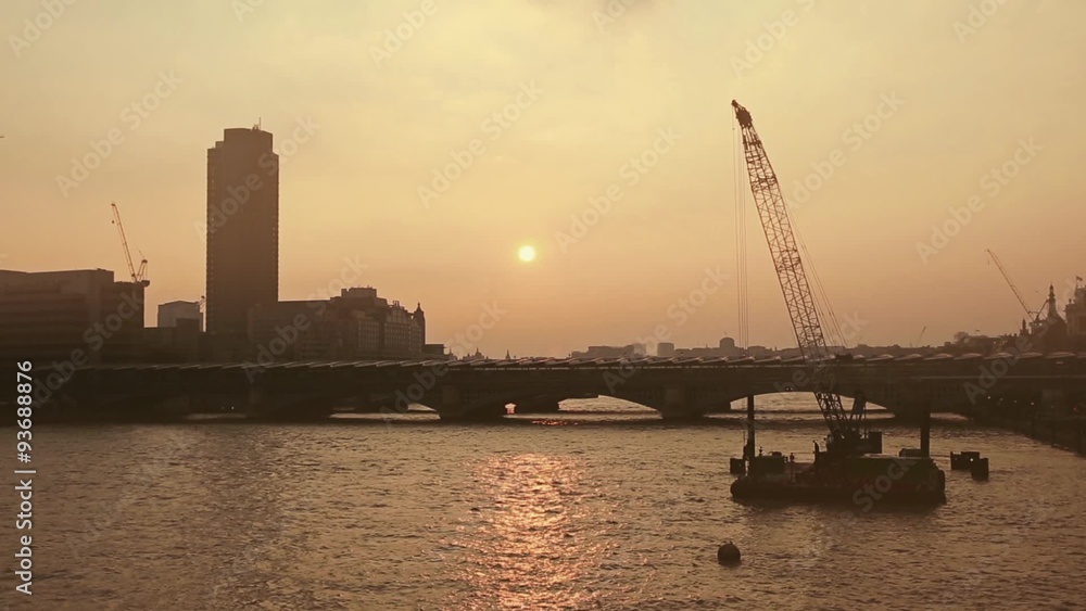 Thames river in London with bridges and buildings on background
Thames river in London with bridges and buildings on background