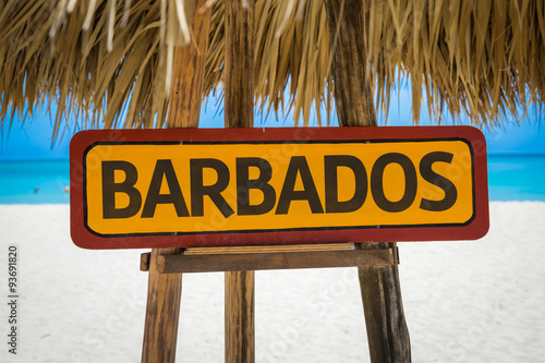 Barbados sign with beach background