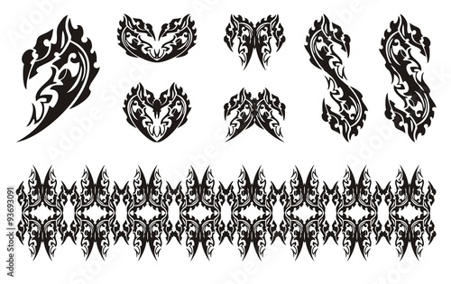 Black dragon head symbols in tribal style. Dollar dragon form, dragon hearts, dragon butterfly and dragon stripe
