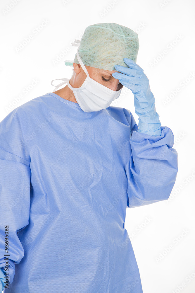 Fototapeta premium tired woman surgeon after a operation