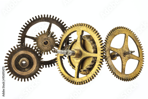 Vintage cogwheels of a clock isolated on white