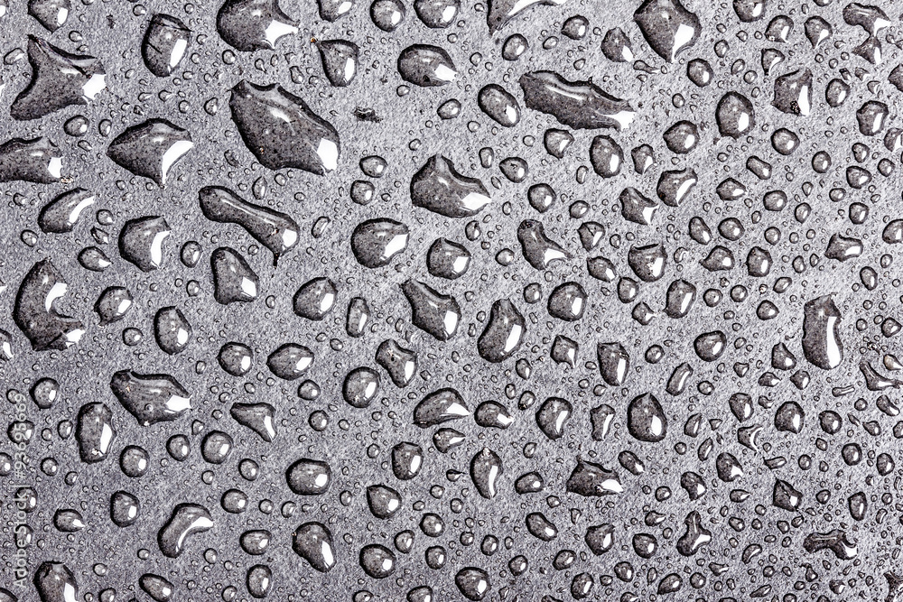 Water bubbles on black surface texture. Water bubbles on black surface texture.