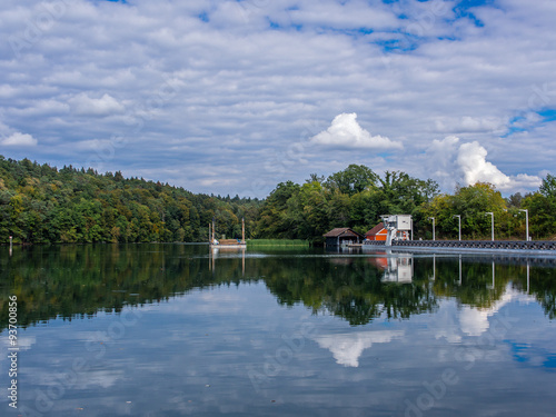 Reflections in a perfectly still artificial lake for power gener