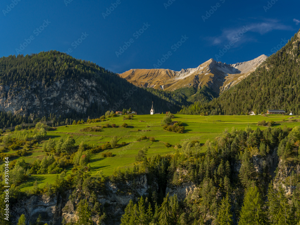 Small church on top of hill in the Swiss Alps 4