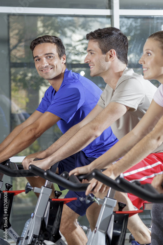 People in a cycling class at a gym