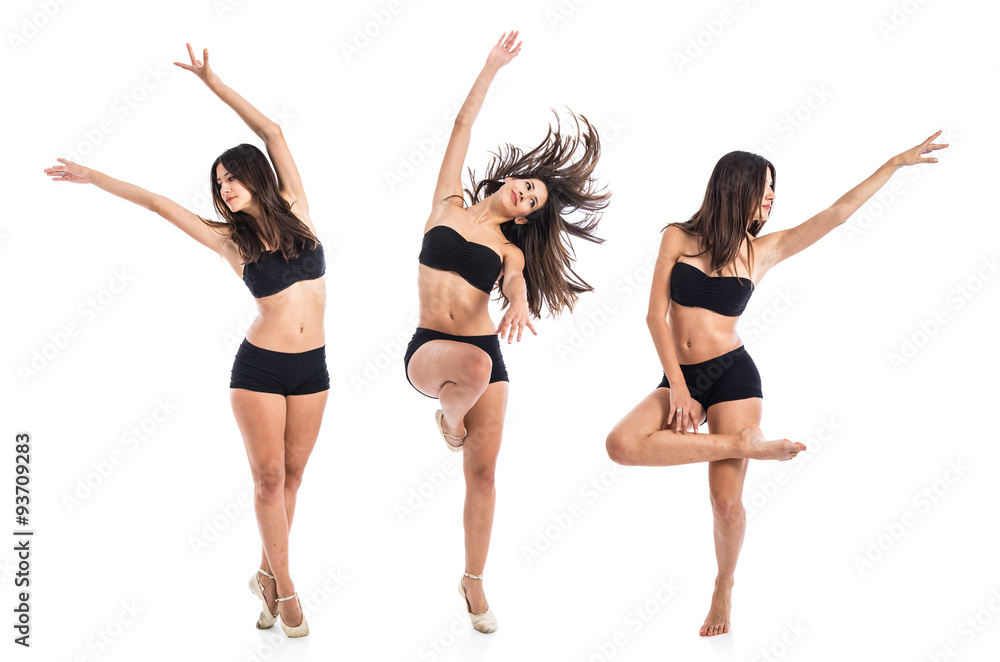 Naklejka premium Young ballet dancer posing over white background