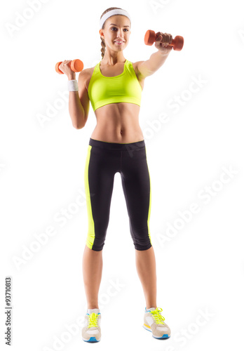 Sporty young girl with dumbbells