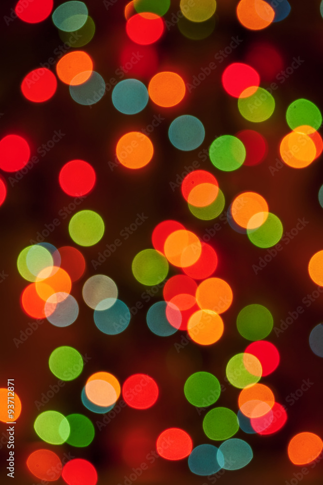 Multicolored defocused bokeh blurry lights, Christmas lights, fe Multicolored defocused bokeh blurry lights, Christmas lights, fe