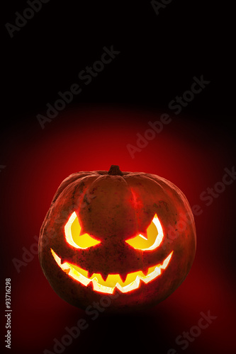 Halloween pumpkin on the dark background.