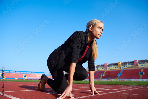 business woman ready to sprint photo