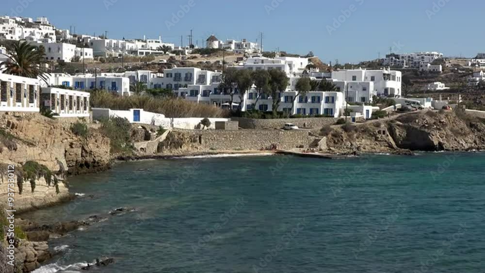 Mykonos Greece white homes above ocean cliff 4K 155 Mykonos Greece white homes above ocean cliff 4K 155