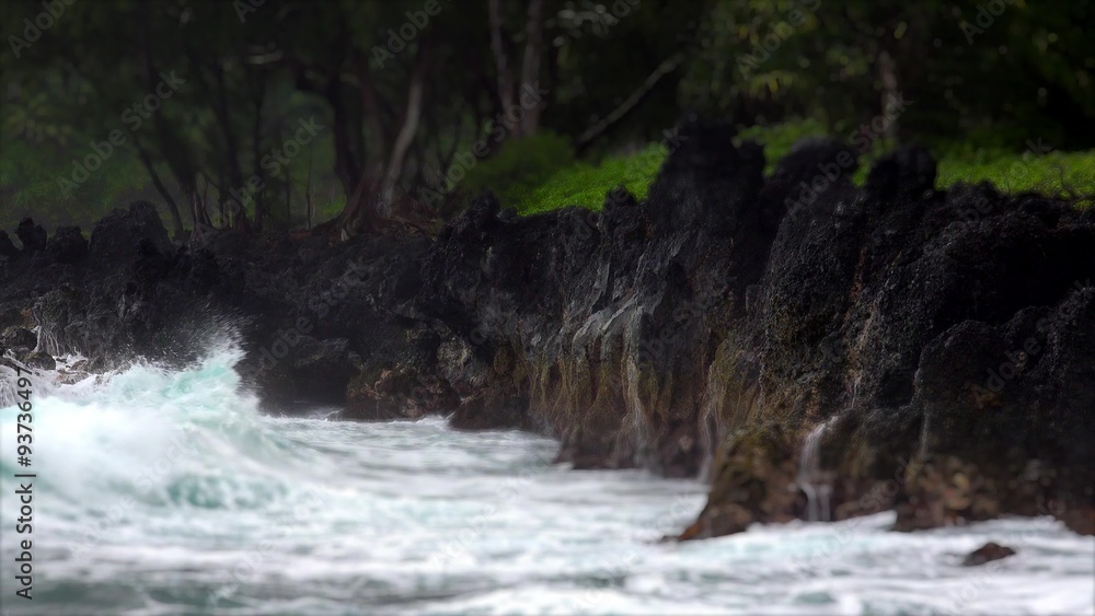 Waves Break on Lava Rock Covered Shoreline in Keanae, Hawaii Waves Break on Lava Rock Covered Shoreline in Keanae, Hawaii