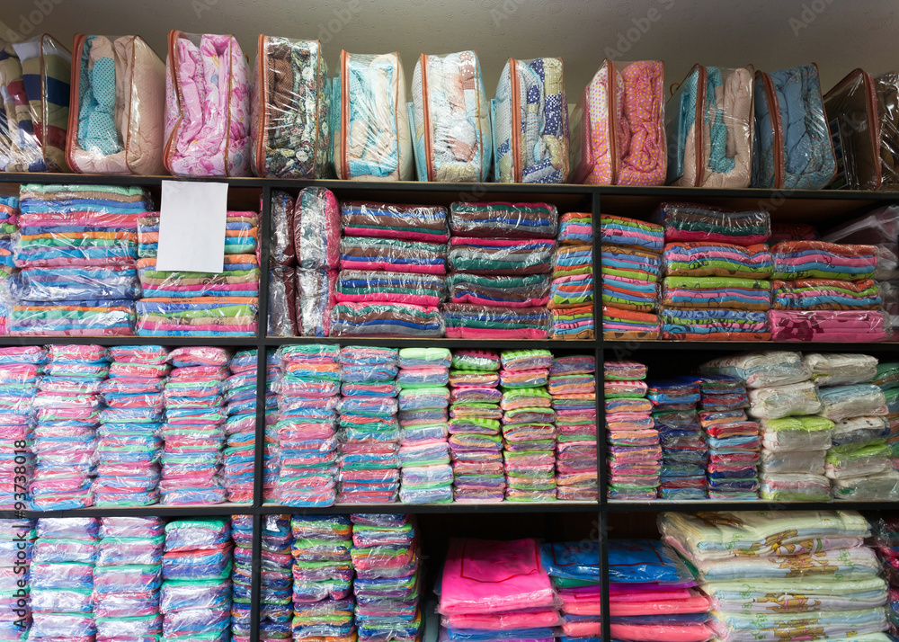 warehouse of towel softness fluffy fiber fabric on shelf