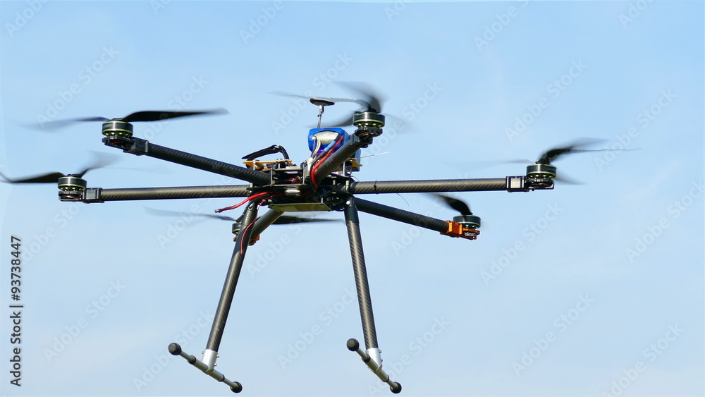 Drone flies in air against blue sky .4K 3840x2160
Drone flies in air against blue sky .4K 3840x2160