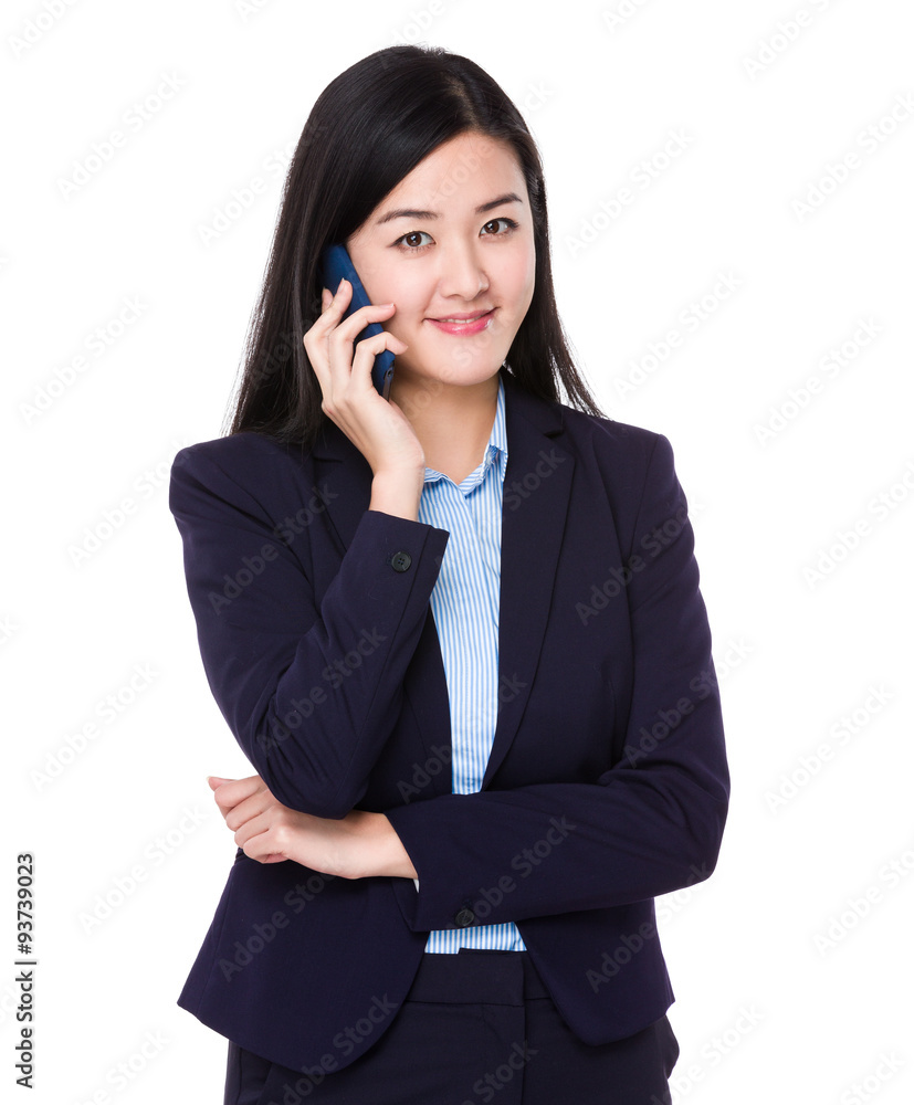 Asian Young businesswoman talk to cellphone Asian Young businesswoman talk to cellphone