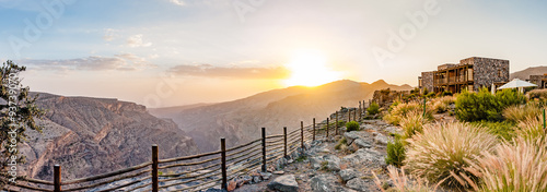 Jabal Akhdar in Al Hajar Mountains, Oman at sunset. It extends about 300 km northwest to southeast, between 50-100 km inland from the Gulf of Oman coast. photo