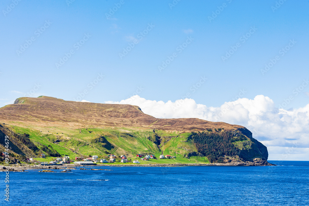 Fototapeta premium Runde with the village on the Norwegian coast
