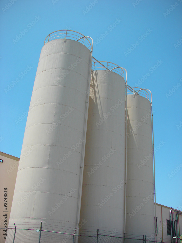 industrial silos with blue sky industrial silos with blue sky