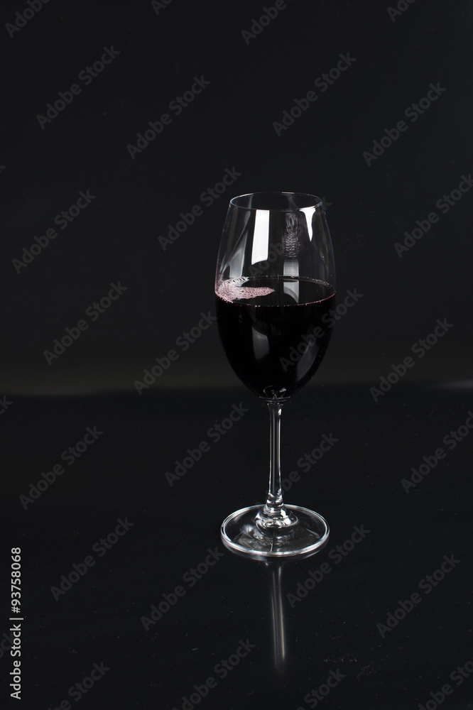 re wine glass on black background re wine glass on black background